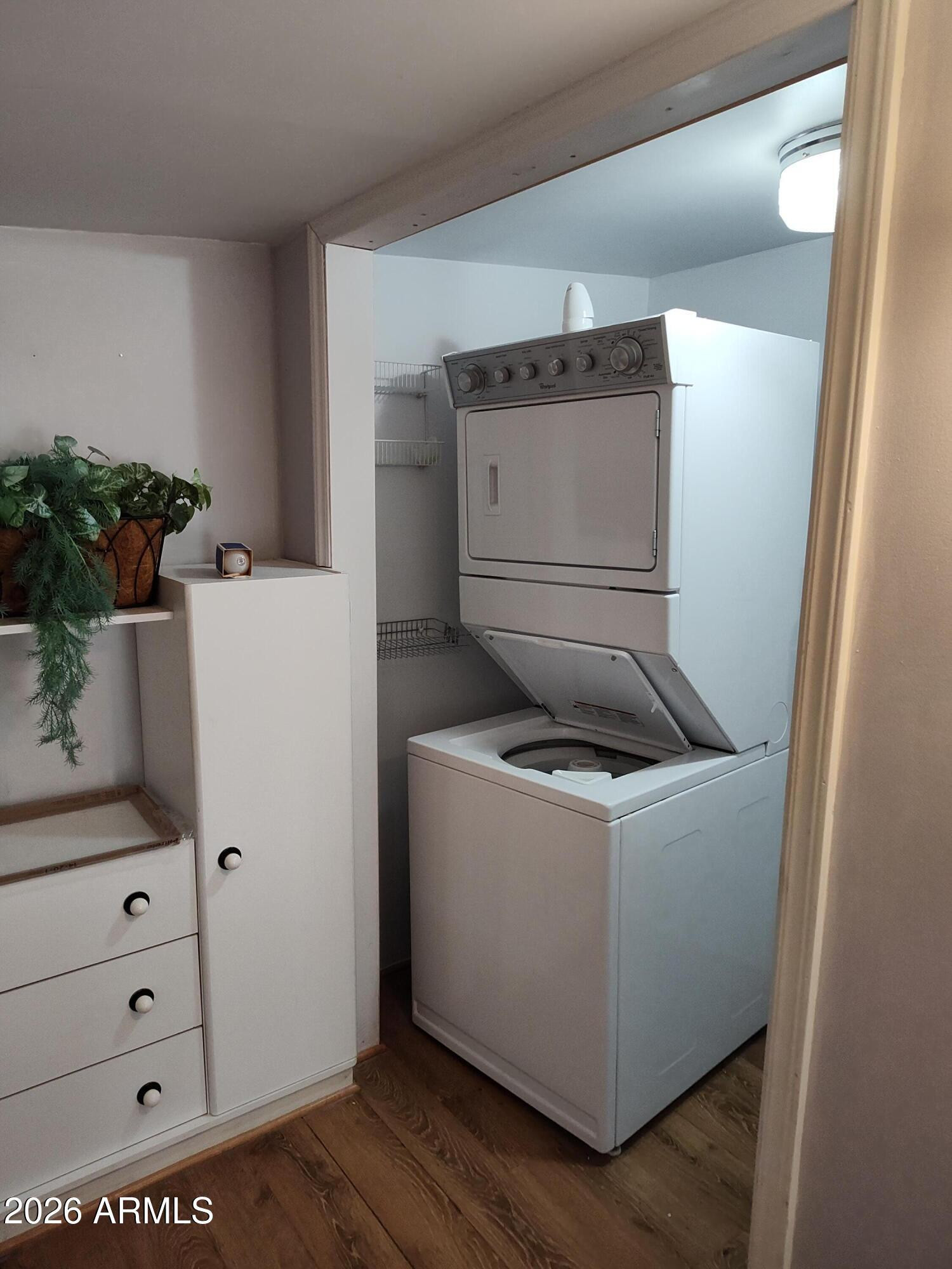 7750 East Broadway Road, Unit LOT 212 Mesa, AZ 85208 - Photo 6 of 12 a utility room with dryer and washer