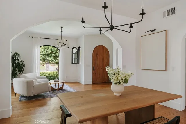 a stove top oven sitting inside of a kitchen