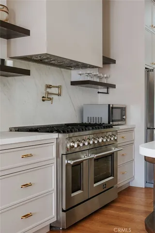 a view of a room with furniture and window