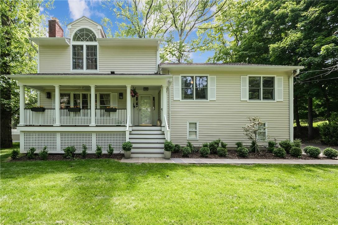 Lovely front porch welcomes you to this home!