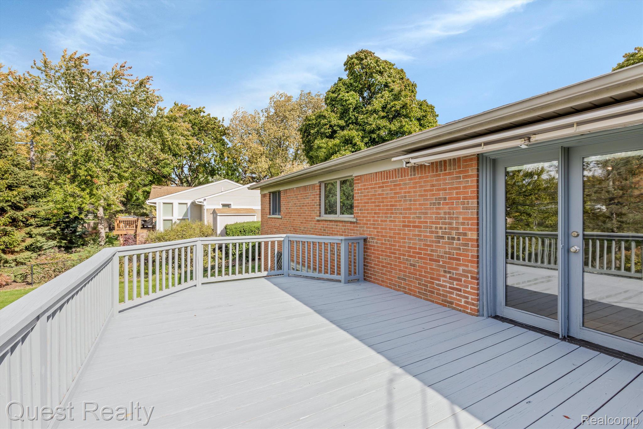 1401 Sycamore Drive Rochester, MI 48307 - Photo 39 of 45 large deck with awning