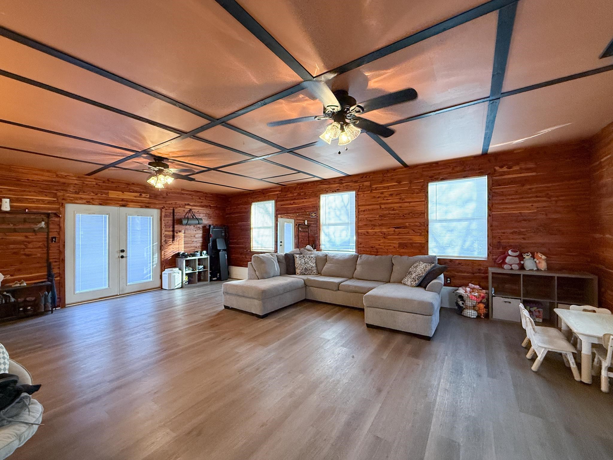 939 Old White Hill Road Stuarts Draft, VA 24477 - Photo 12 of 22 a living room with furniture windows and wooden floor