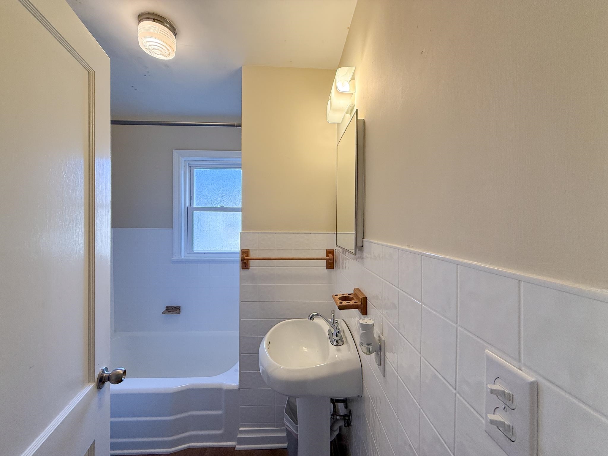 939 Old White Hill Road Stuarts Draft, VA 24477 - Photo 18 of 22 a bathroom with a sink and a mirror