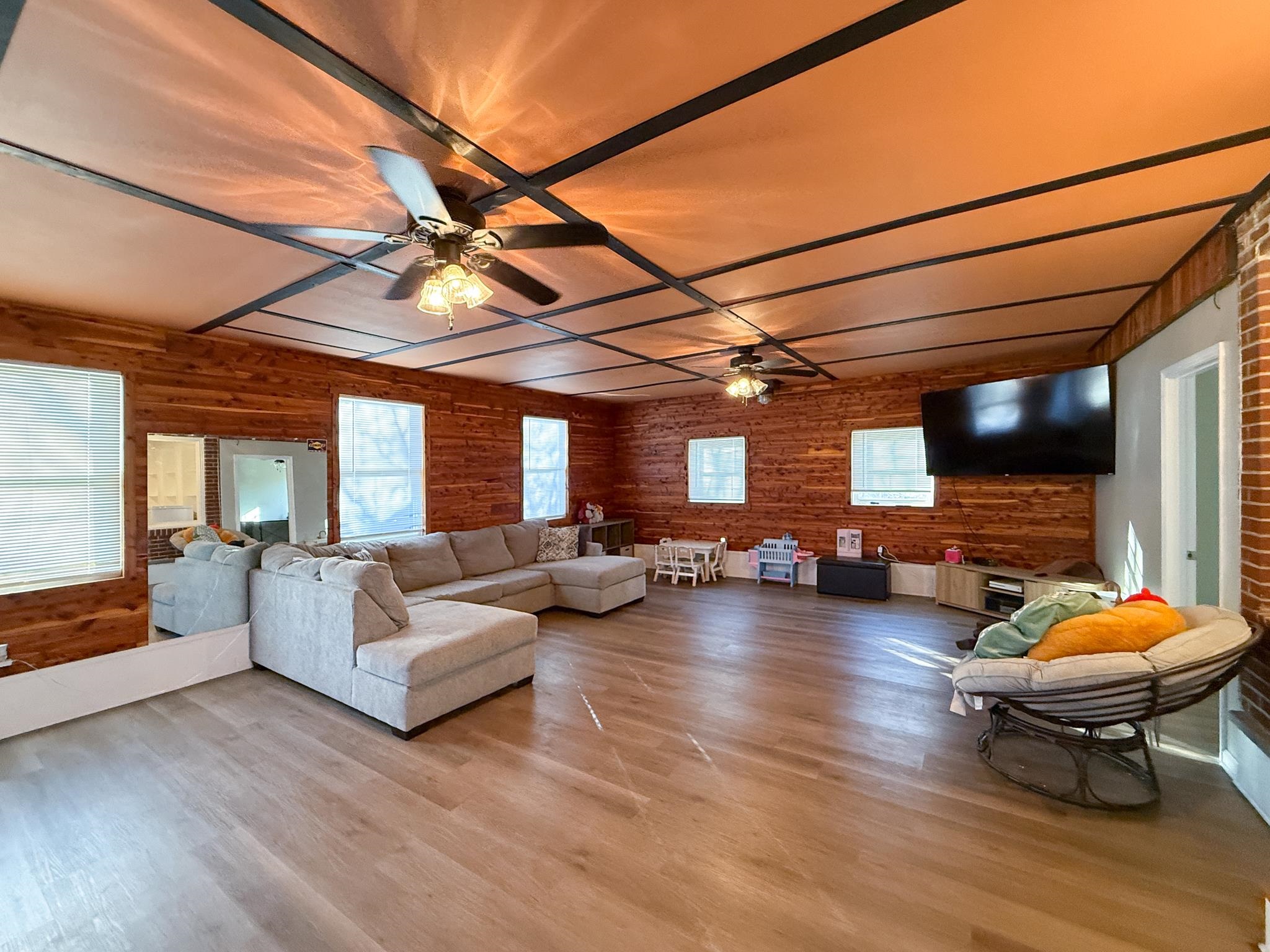 939 Old White Hill Road Stuarts Draft, VA 24477 - Photo 2 of 22 a living room with furniture and flat screen tv