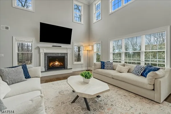 a living room with furniture and a table