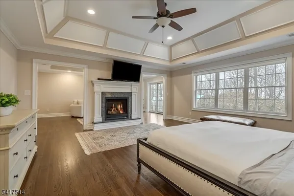 a bedroom with a bed and a table