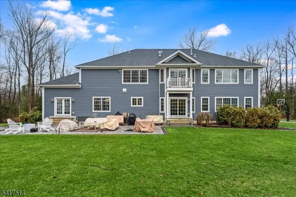 a view of a golf course with a tree