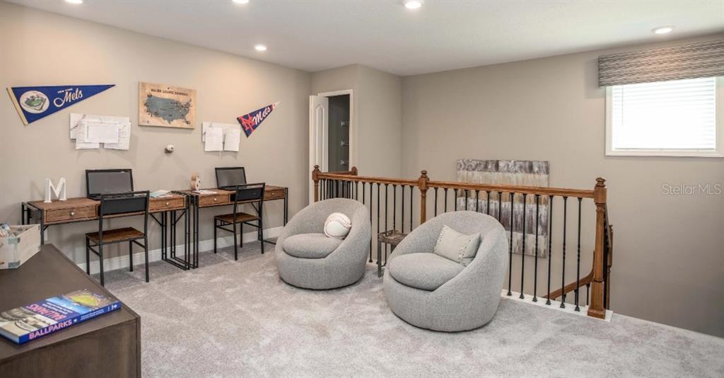 3824 Bluethread Way Kissimmee, FL 34759 - Photo 19 of 28 a living room with furniture