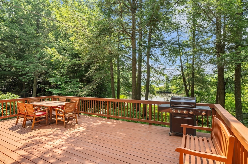 32 Pond Hill Road Goshen, MA 01096 - Photo 17 of 24 a view of backyard with seating and trees