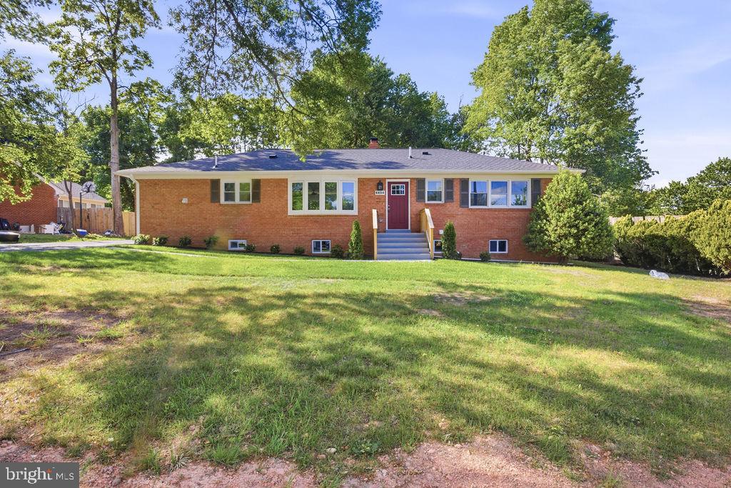6620 Napoli Road Temple Hills, MD 20748 - Photo 2 of 38 a view of a house with a yard and sitting area