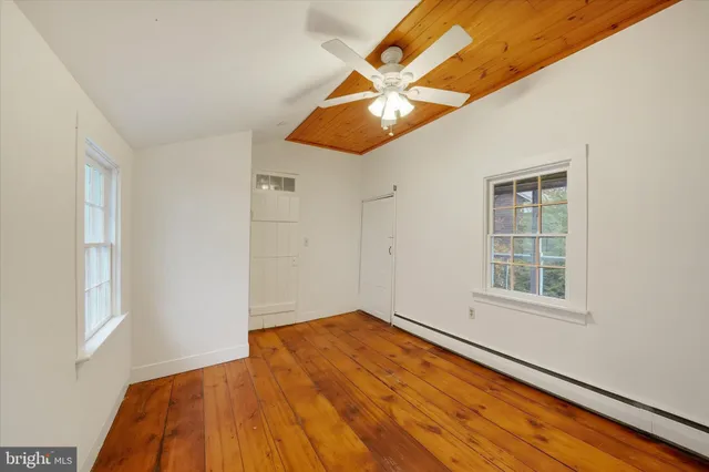 an empty room with windows