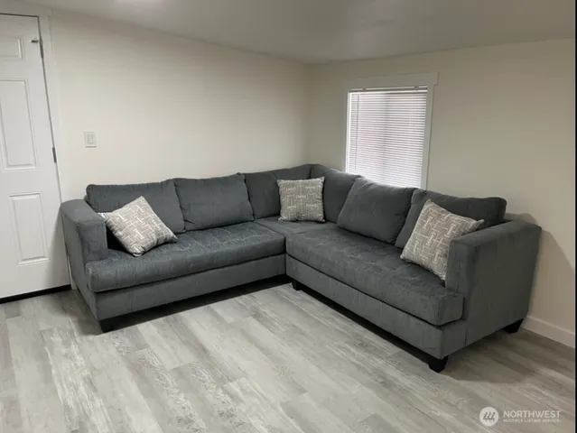 a living room with furniture and a couch