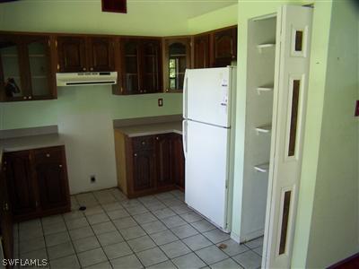 18349 Matanzas Road Fort Myers, FL 33967 - Photo 4 of 10 a utility room with dryer and washer