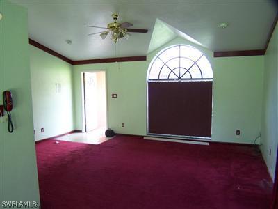 18349 Matanzas Road Fort Myers, FL 33967 - Photo 5 of 10 a view of an empty room with a window
