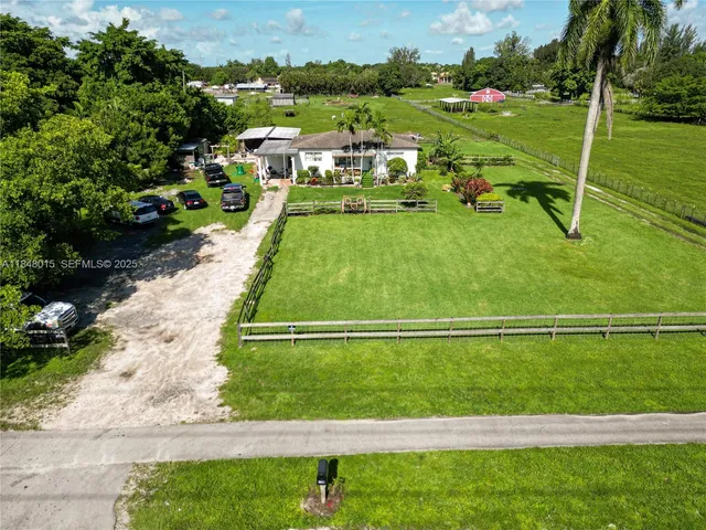 a view of a golf course with a lake