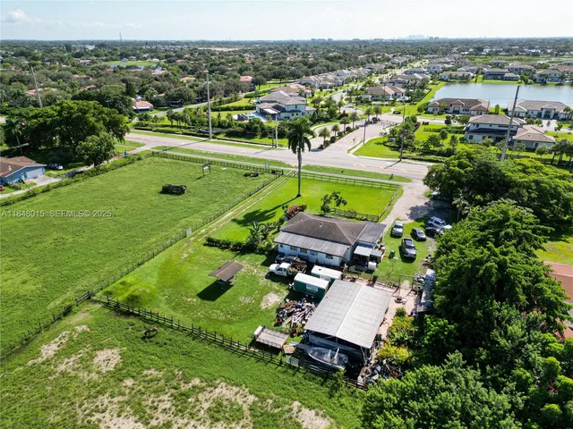 an aerial view of a house with a garden