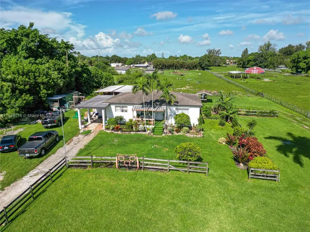 a view of a house with a big yard