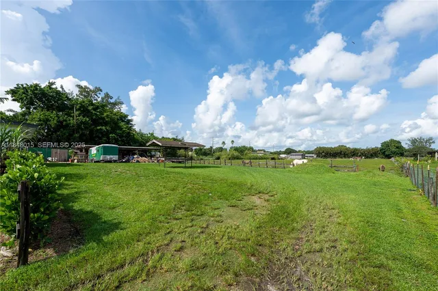 a view of a golf course with a lake
