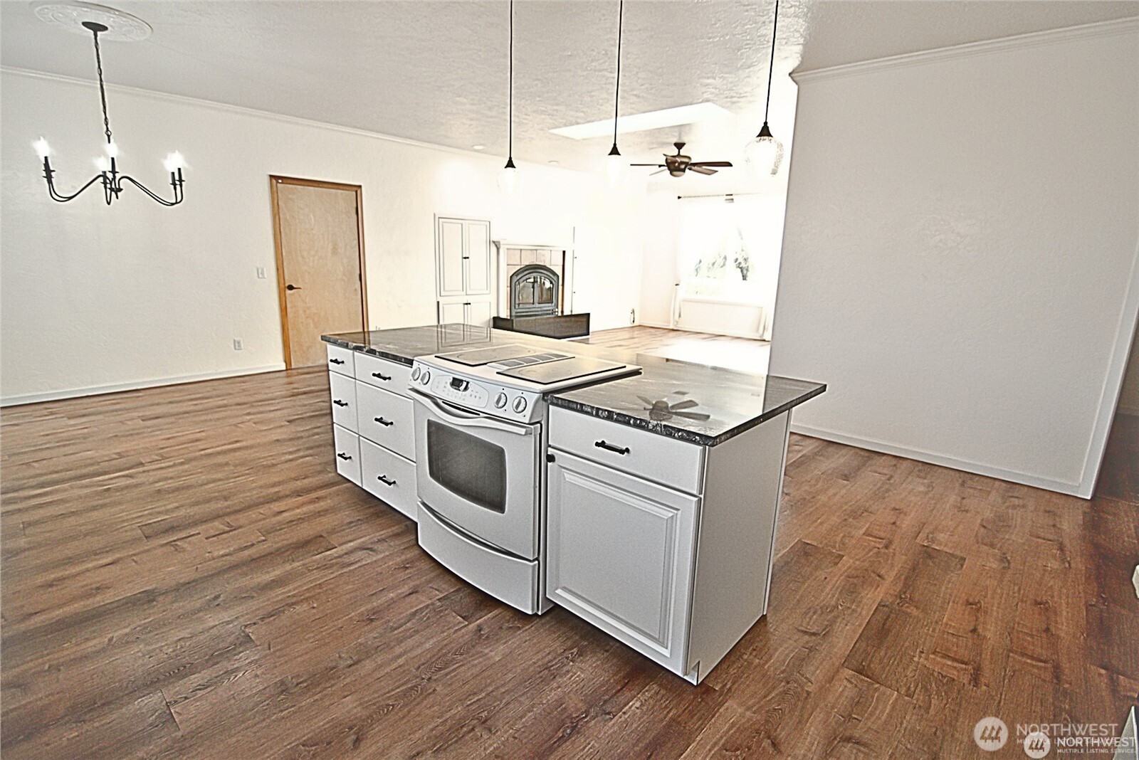 116 Taylor Road South Chehalis, WA 98532 - Photo 8 of 35 a kitchen with a stove and wooden floor