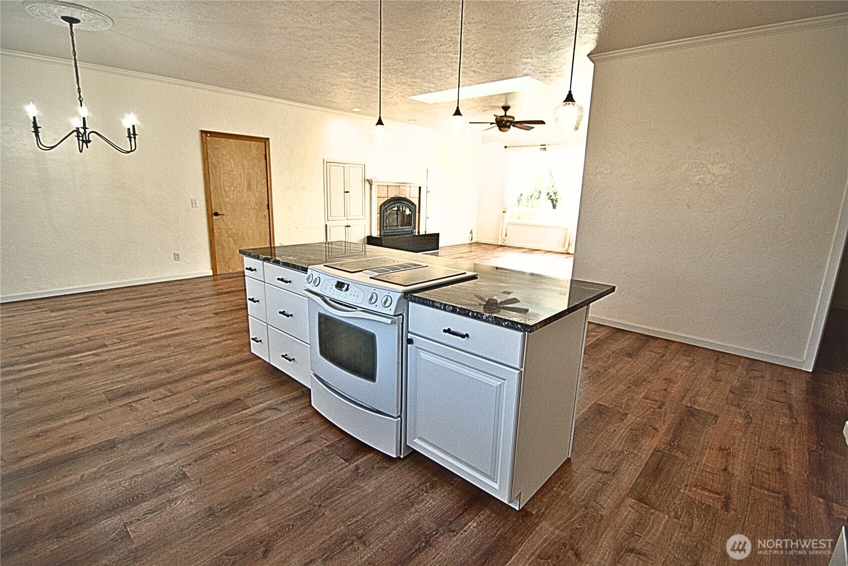 116 Taylor Road South Chehalis, WA 98532 - Photo 8 of 35 a kitchen with a stove and wooden floor