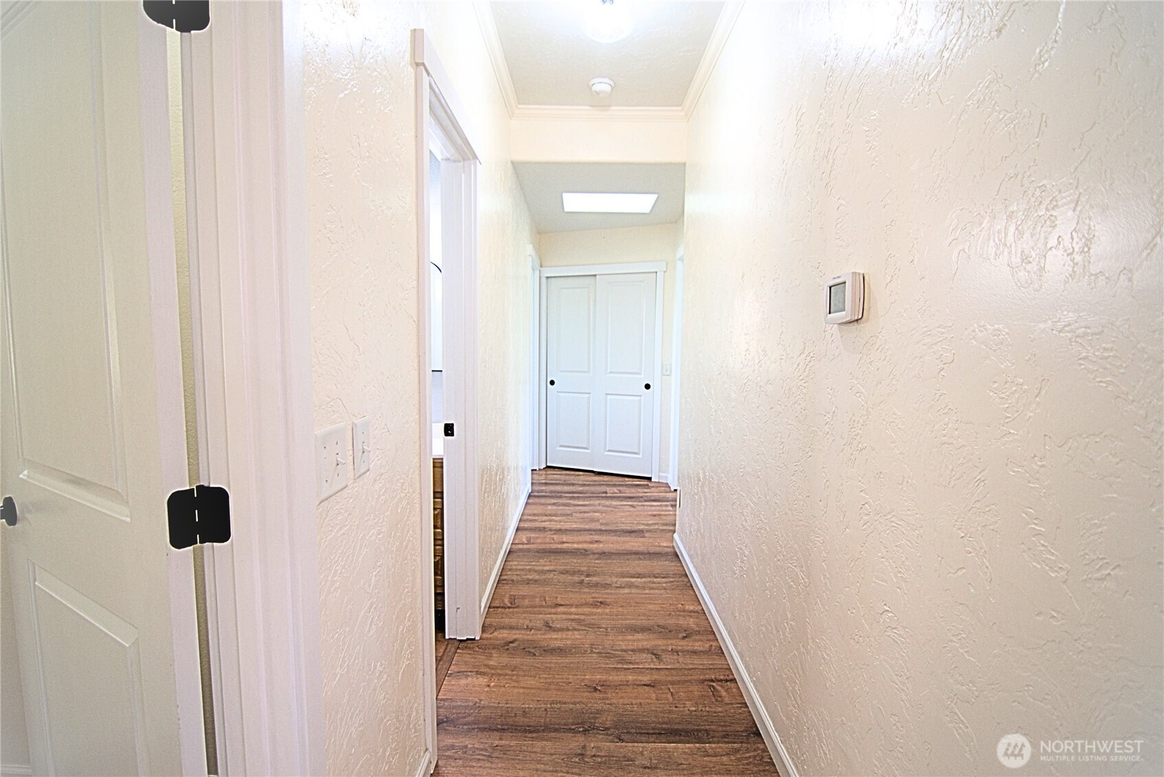116 Taylor Road South Chehalis, WA 98532 - Photo 10 of 35 a view of a hallway with wooden floor and staircase