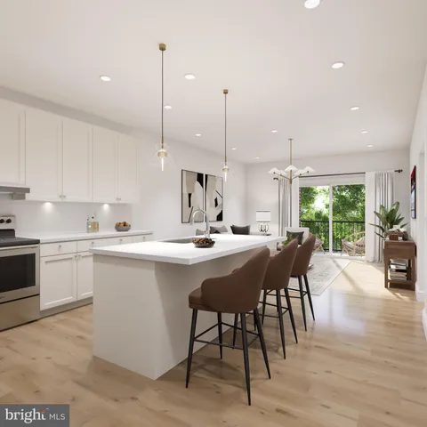 a kitchen with a table chairs sink and cabinets
