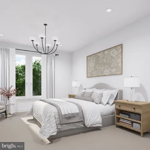 a bedroom with a bed and ceiling fan