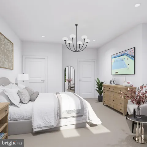 a bedroom with a bed and ceiling fan