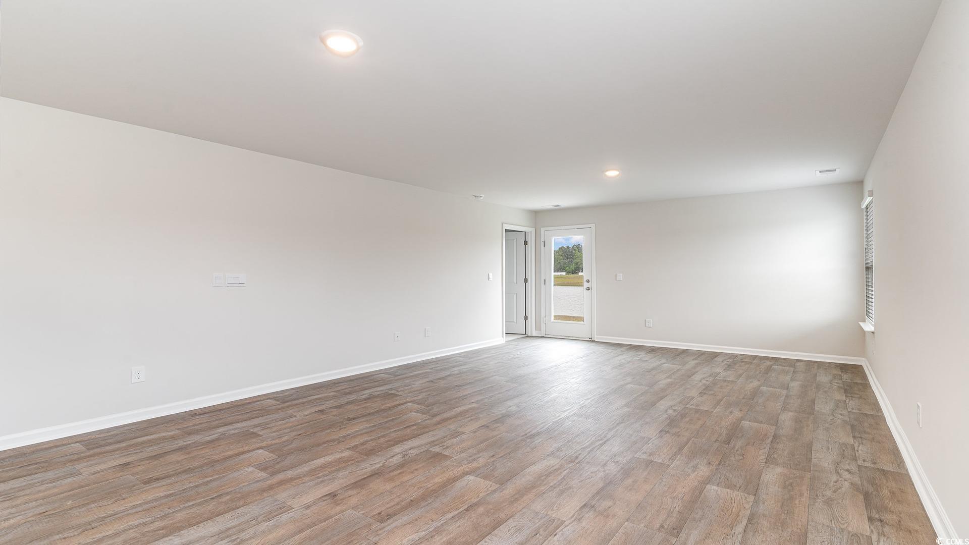 425 Flank Street Myrtle Beach, SC 29588 - Photo 4 of 19 Empty room featuring recessed lighting, baseboards