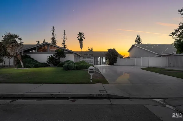 a view of a house with a street