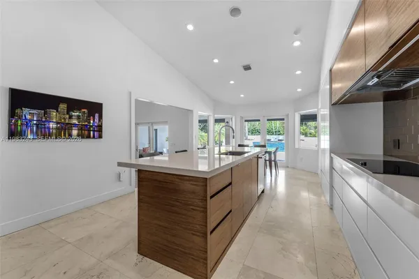 a dining room with furniture window and outside view