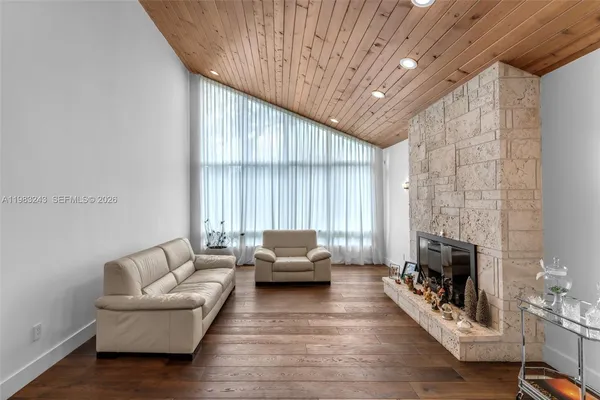 a bathroom with a toilet a sink and shower
