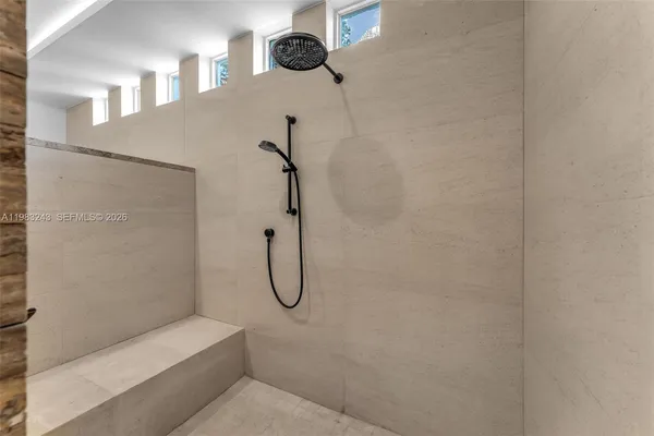 a view of a yard with palm trees