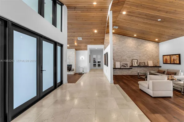 a kitchen with stainless steel appliances granite countertop a stove and a refrigerator