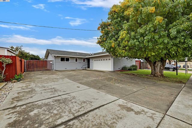 a house view with a outdoor space