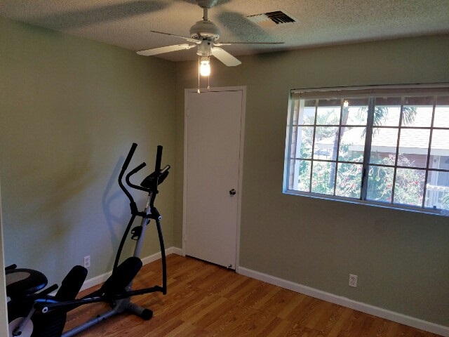 140 Uwapo Road, Unit 22204 Kihei, HI 96753 - Photo 16 of 19 a view of a room with gym equipment