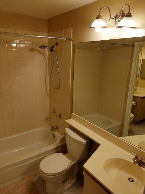 140 Uwapo Road, Unit 22204 Kihei, HI 96753 - Photo 17 of 19 a bathroom with a sink toilet and shower