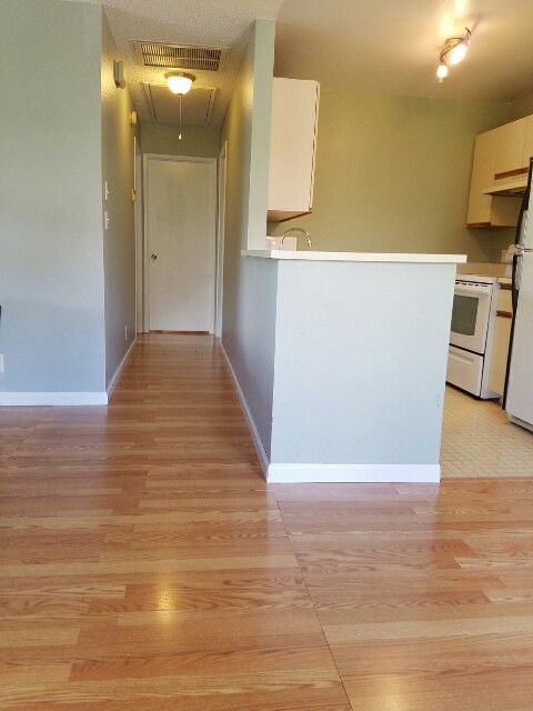 140 Uwapo Road, Unit 22204 Kihei, HI 96753 - Photo 10 of 19 a view of a kitchen from the hallway