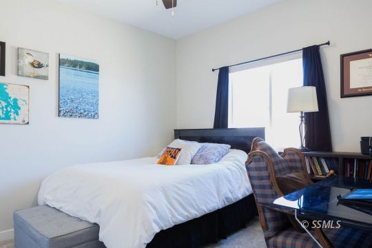 411 Abigail Street Ridgecrest, CA 93555 - Photo 27 of 39 a bedroom with bed and window