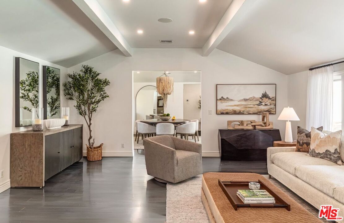 5840 Round Meadow Road Hidden Hills, CA 91302 - Photo 4 of 28 a living room with furniture and a large window