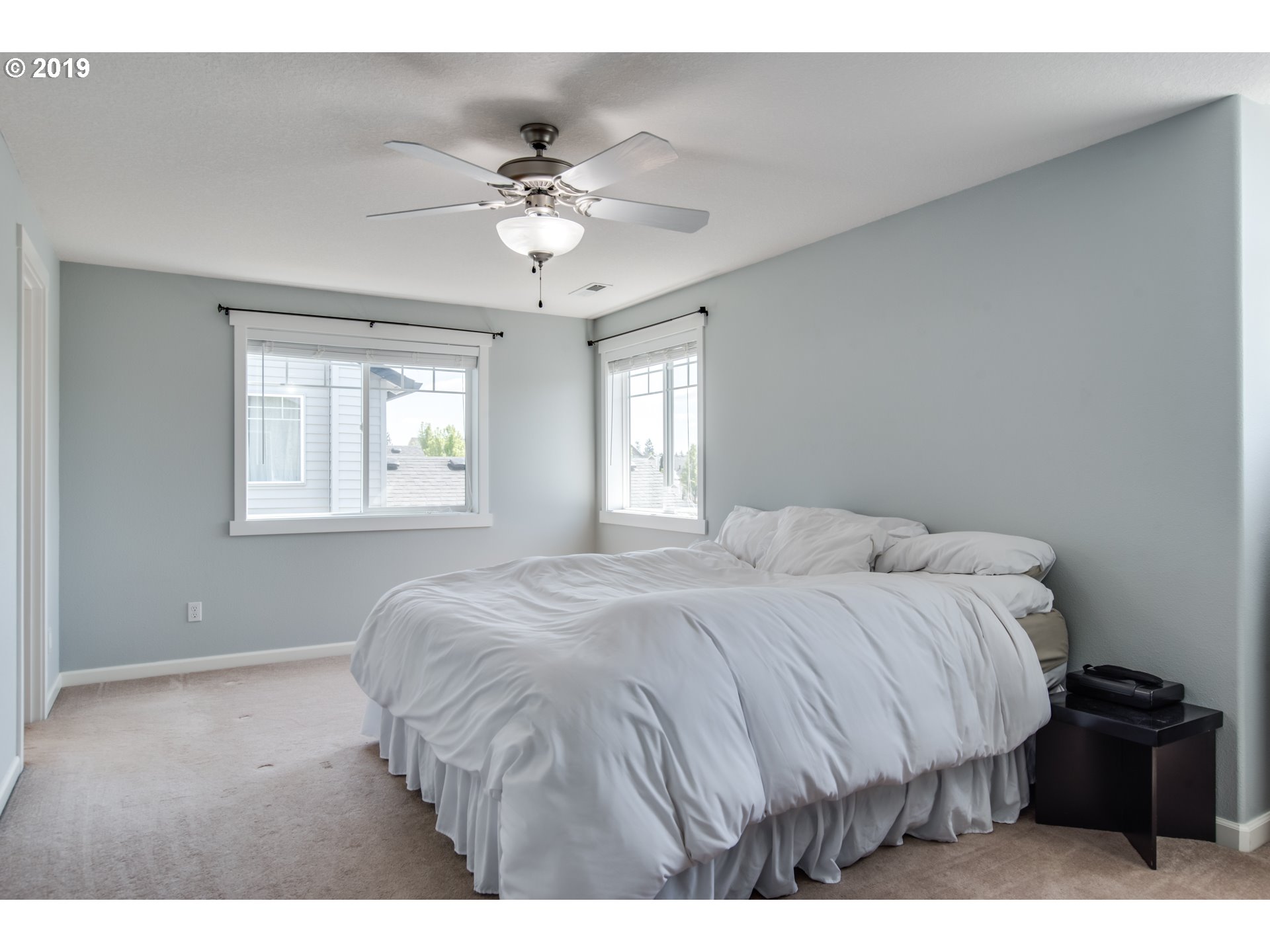 2014 North Falcon Drive Ridgefield, WA 98642 - Photo 16 of 32 a bedroom with a bed and window
