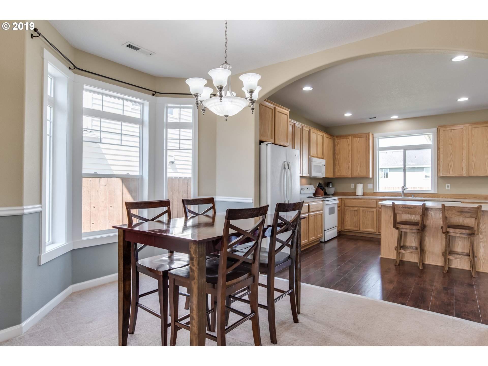 2014 North Falcon Drive Ridgefield, WA 98642 - Photo 23 of 32 a view of a dining room with furniture window and wooden floor