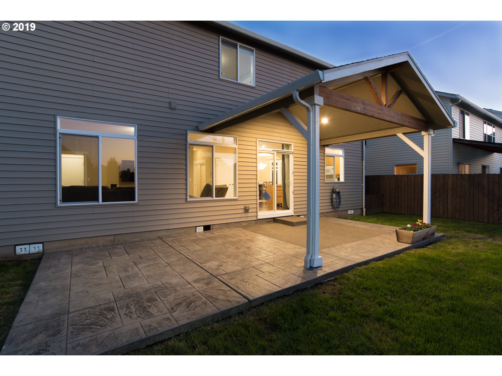2014 North Falcon Drive Ridgefield, WA 98642 - Photo 25 of 32 a view of an house with backyard space and garden