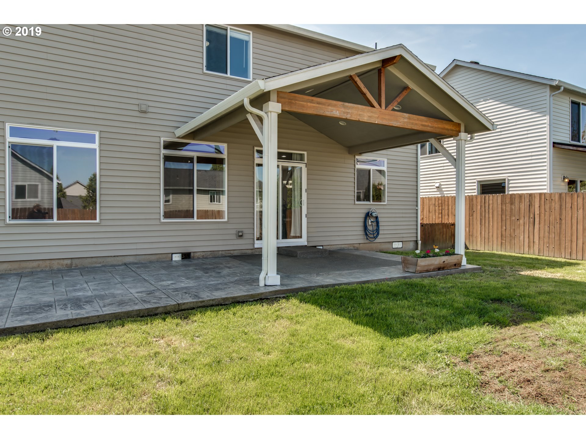 2014 North Falcon Drive Ridgefield, WA 98642 - Photo 28 of 32 a view of a house with a backyard