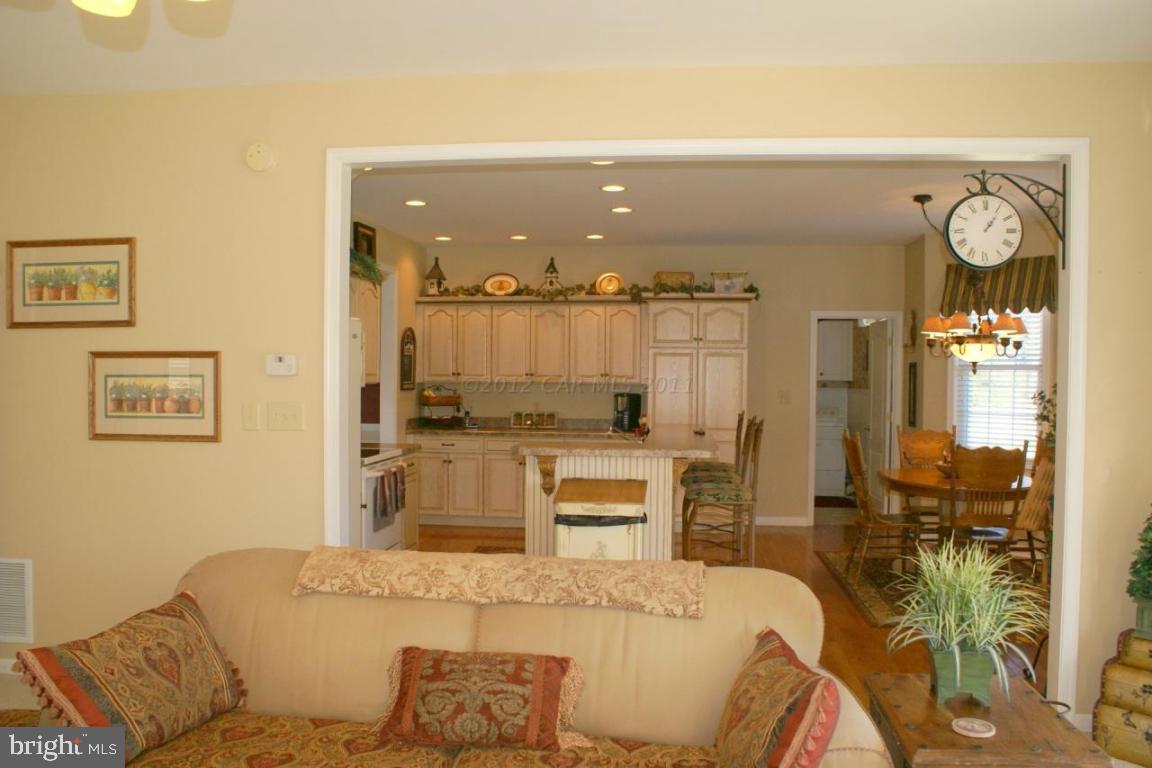3535 Redden Ferry Road Eden, MD 21822 - Photo 6 of 24 a living room with furniture and a chandelier