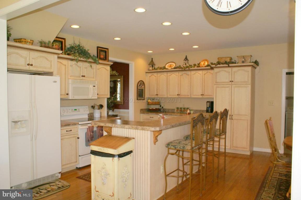 3535 Redden Ferry Road Eden, MD 21822 - Photo 7 of 24 a large kitchen with a table and chairs