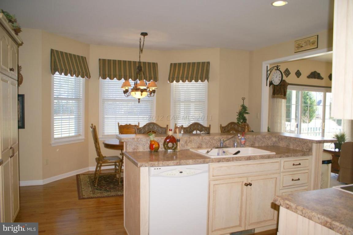 3535 Redden Ferry Road Eden, MD 21822 - Photo 8 of 24 a bathroom with a granite countertop sink and a mirror