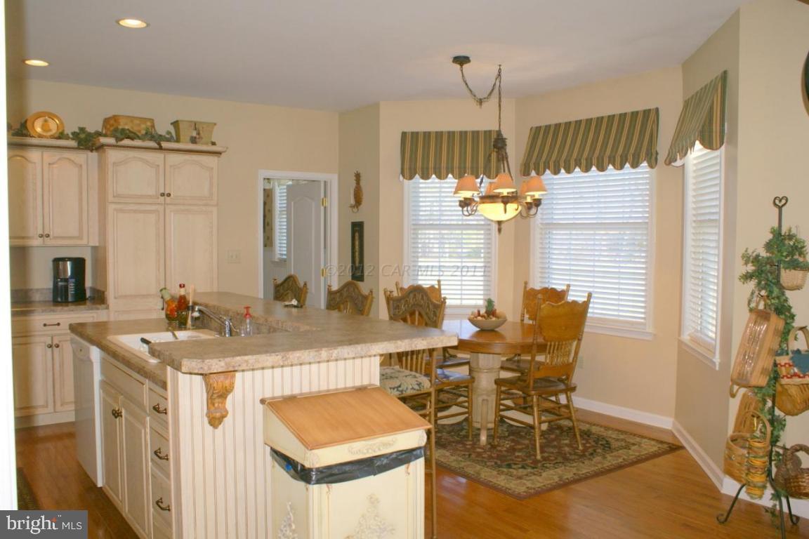 3535 Redden Ferry Road Eden, MD 21822 - Photo 10 of 24 a view of a dining room with furniture and chandelier