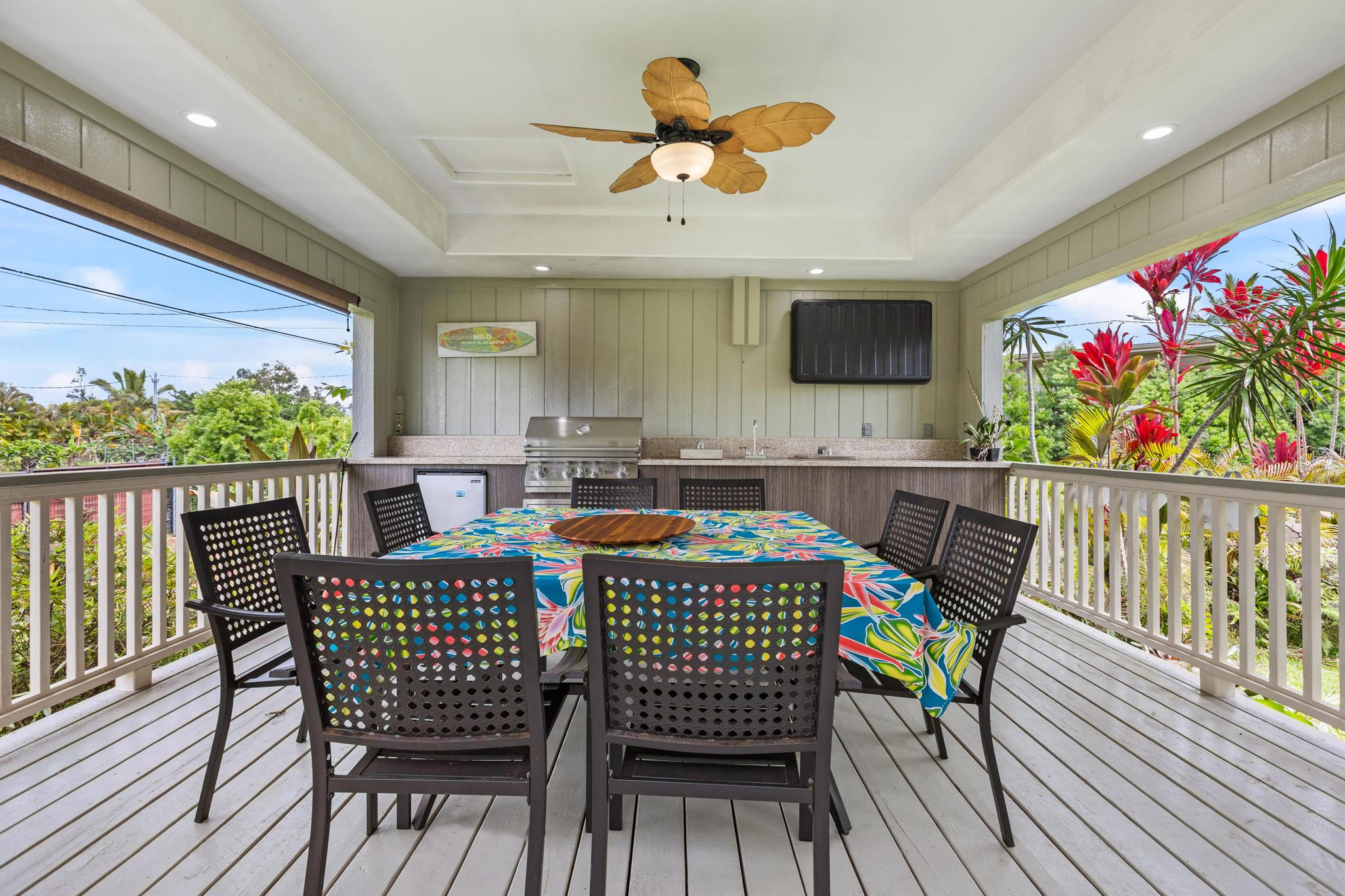 15-1635 Beach Road Keaau, HI 96749 - Photo 18 of 29 a outdoor dining space with furniture and wooden floor