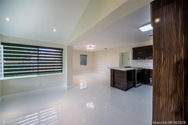 a room with furniture and a window